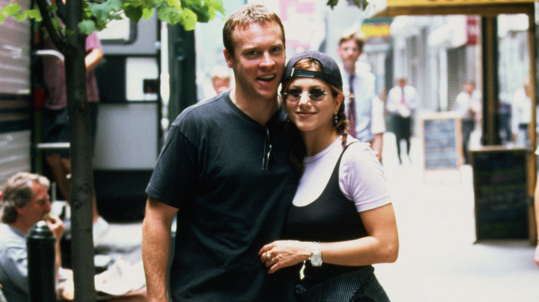  Tate Donovan and Jennifer Aniston smiling