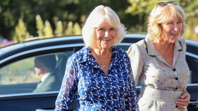 Queen Camilla and Annabel Elliot walking