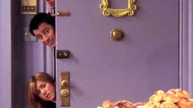 The One With the Late Thanksgiving episode of friends, with characters sticking heads through door