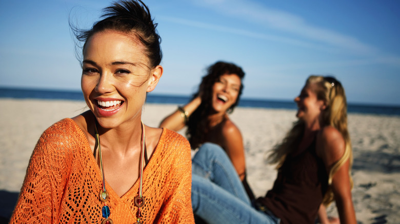 friends hanging out at beach