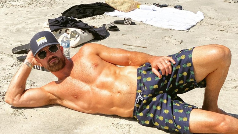 Rob McElhenney shirtless on beach in 2020