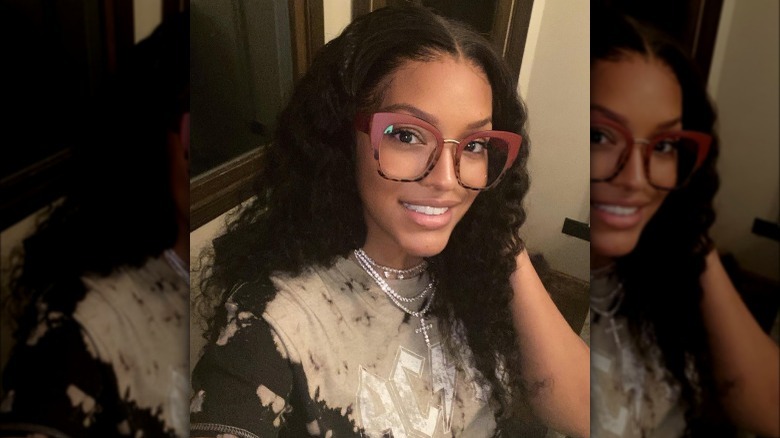 Drew Sidora wearing glasses