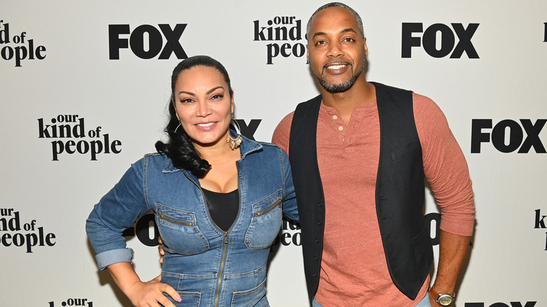 Egypt Sherrod and Mike Jackson smiling on the red carpet