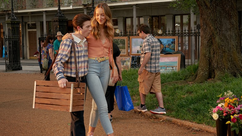 Ava Michelle and Griffin Gluck walking arm in arm in Tall Girl 2