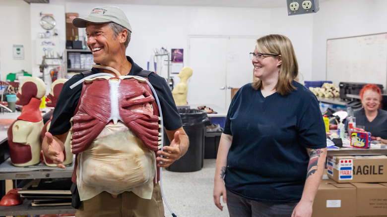 Mike Rowe holding fake organs