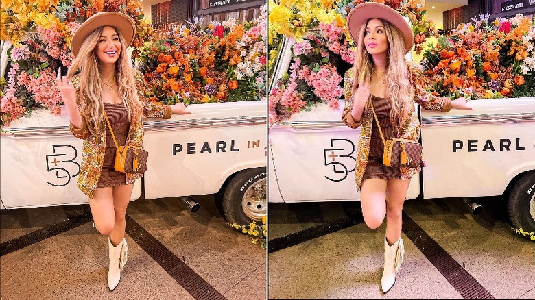 woman wearing cream cowboy boots