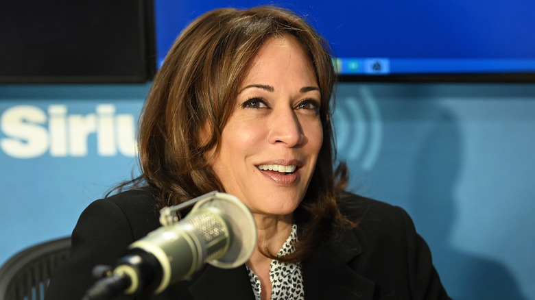 Kamala Harris smiling and speaking with host Mark Thompson at SiriusXM's New York Studios on April 5, 2019 in New York City