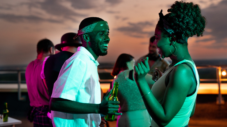 Couple dancing together outside