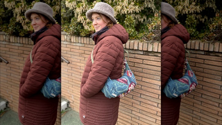 woman wearing printed crossbody bag