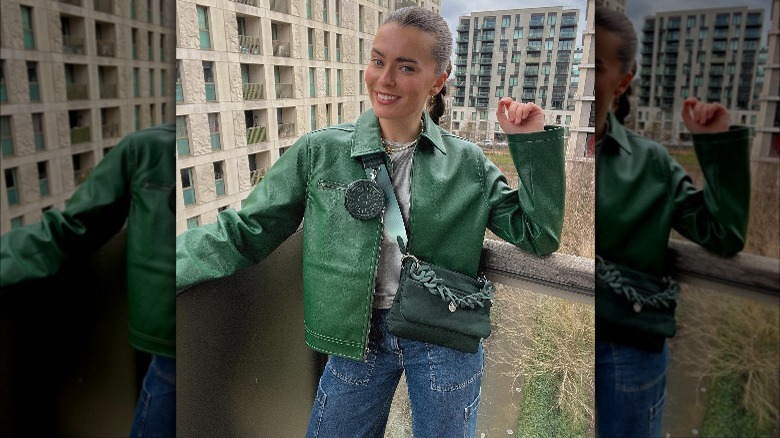 woman styling matching green bag and jacket