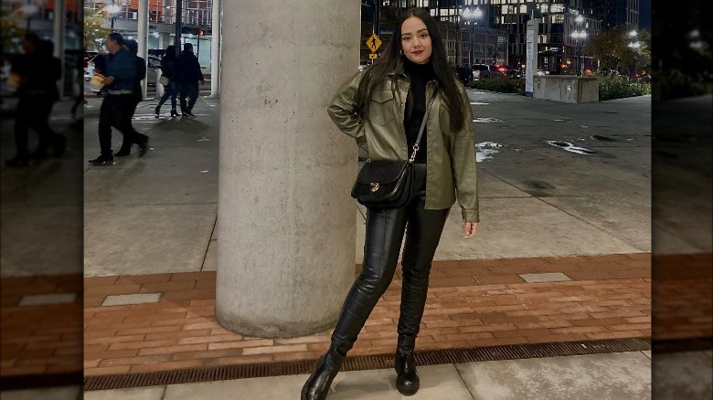 leather outfit paired with crossbody bag