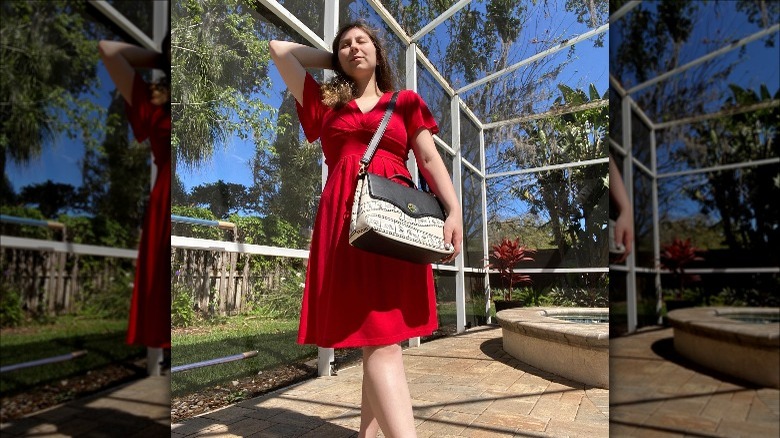 woman with red crossbody bag