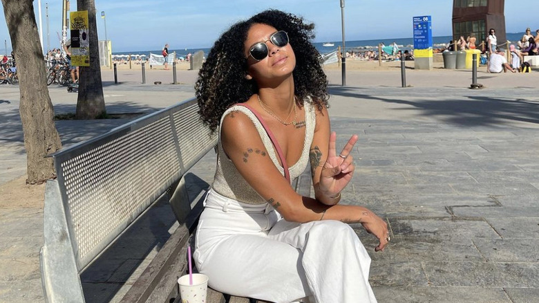 Gabriela Barragan sits on a bench