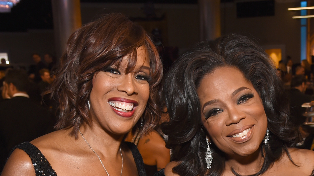 Gayle King and Oprah Winfrey at event