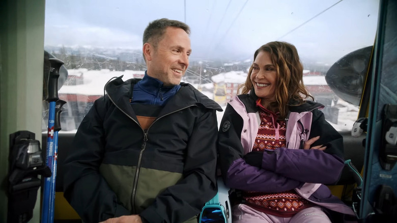 General Hospital's William deVry and Teri Hatcher smiling on a ski lift