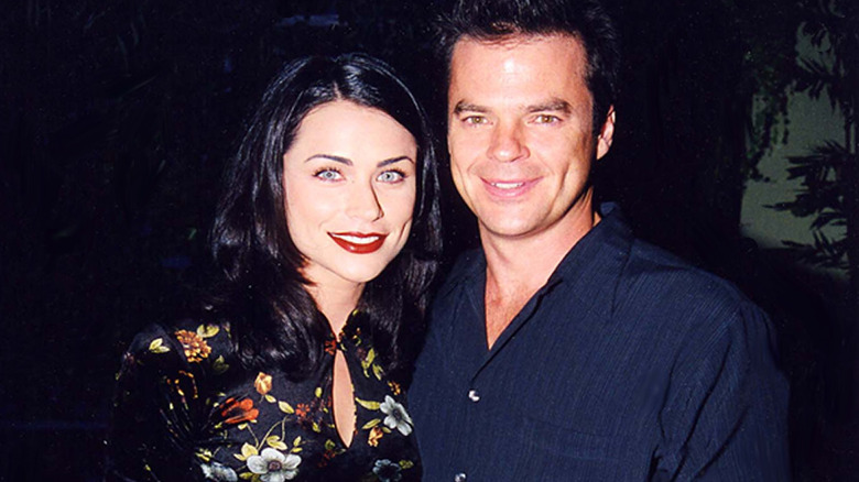 Rena Sofer and Wally Kurth smiling