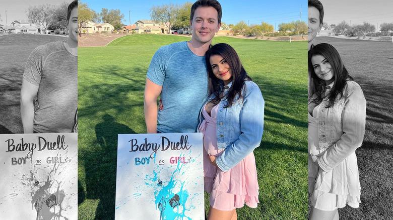 Chad Duell and Luana Lucci holding their gender reveal sign