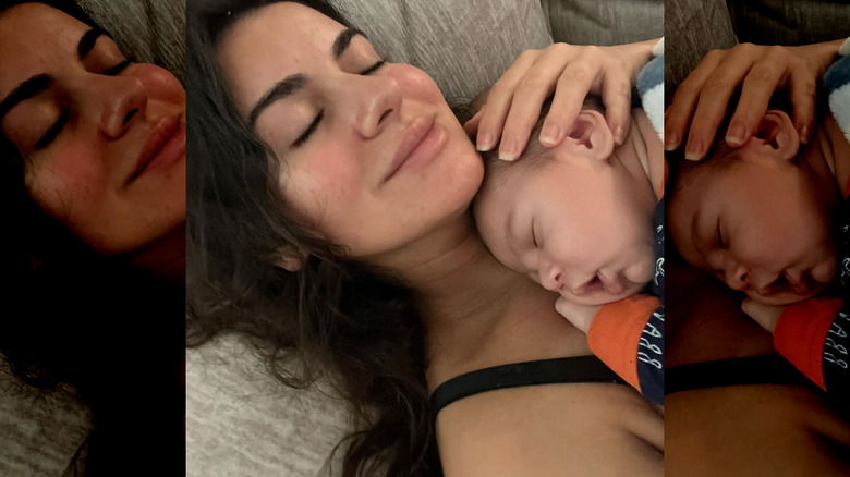 Luana Lucci snuggling her baby