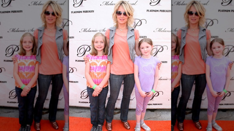 Cynthia Watros and her twins on the red carpet