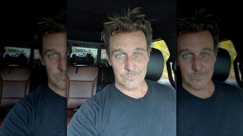 Ingo Rademacher sitting in a car