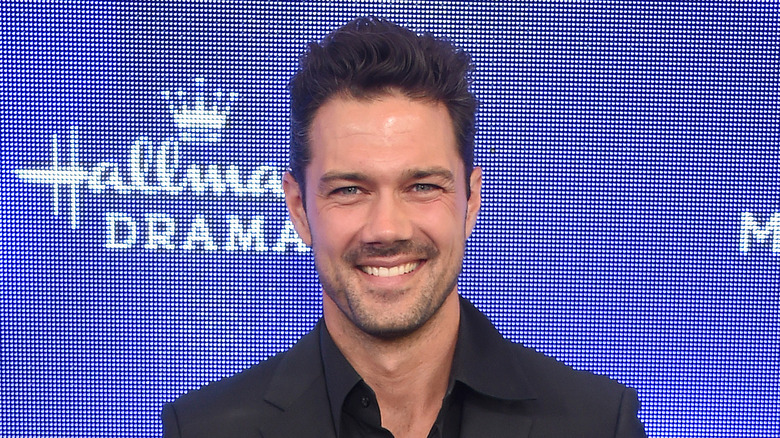 Ryan Paevey smiling