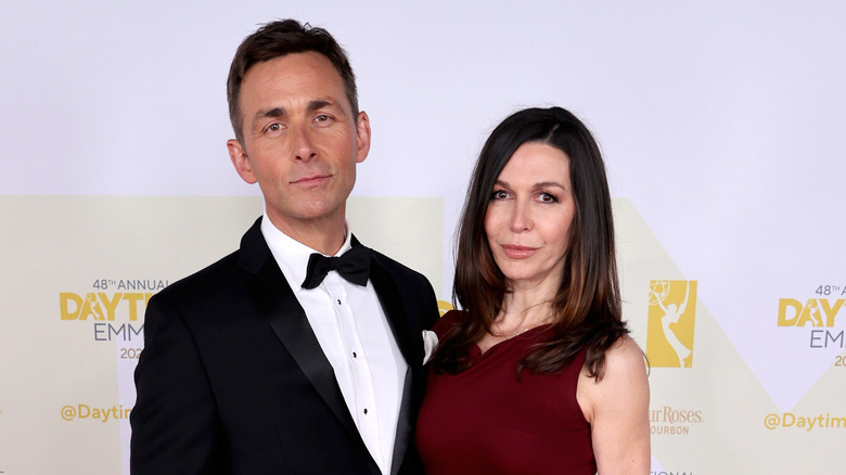 James Patrick Stuart and Finola Hughes posing