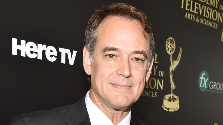 Jon Lindstrom smirking