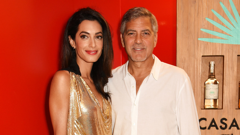 George and Amal posing