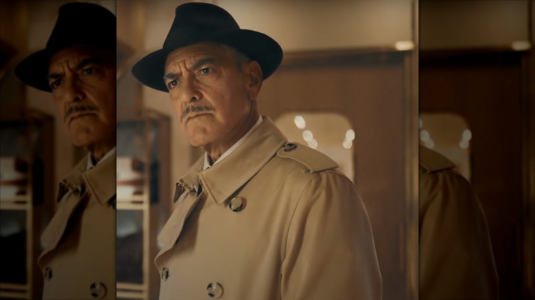 George Clooney with a mustache looking confused in Nespresso ad