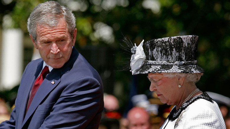 Queen Elizabeth and George W. Bush standing