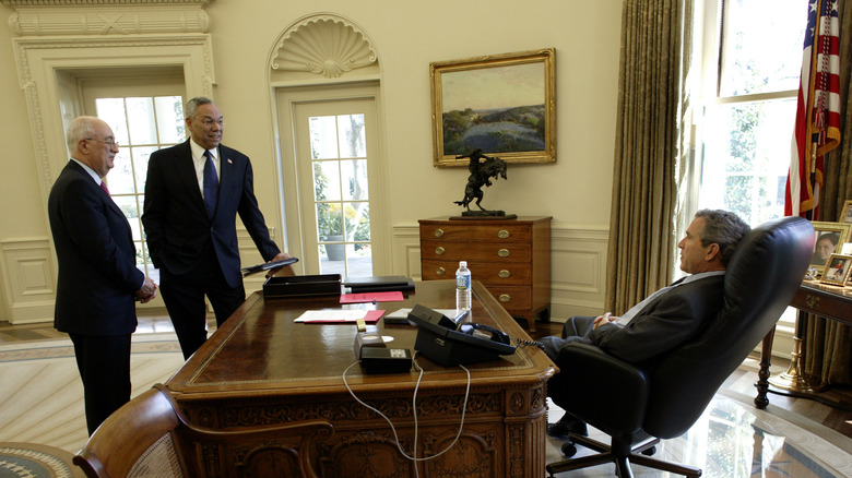 Cheney, Powell, and Bush in the Oval Office