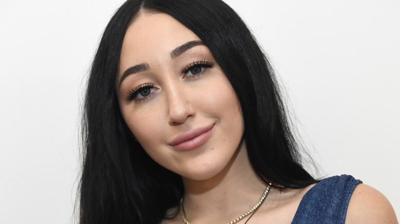 Noah Cyrus smiling