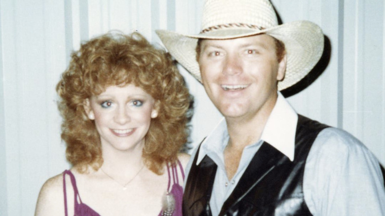 Reba and Pake McEntire smiling in throwback photo