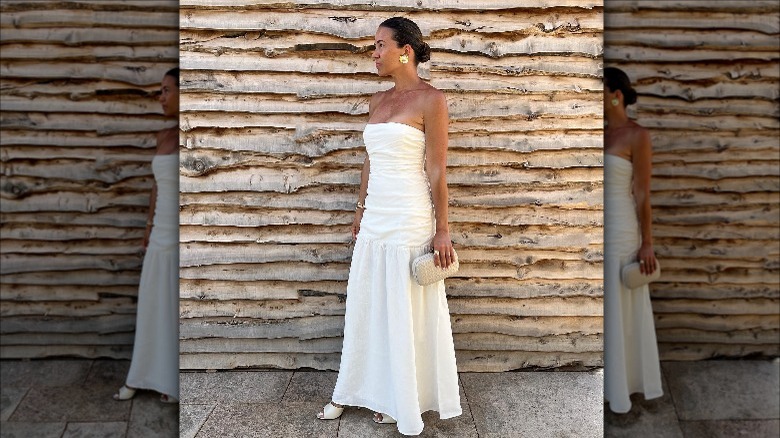 woman wearing white strapless gown side profile 