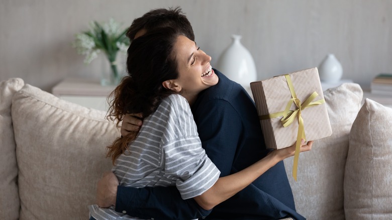 Woman hugging man 