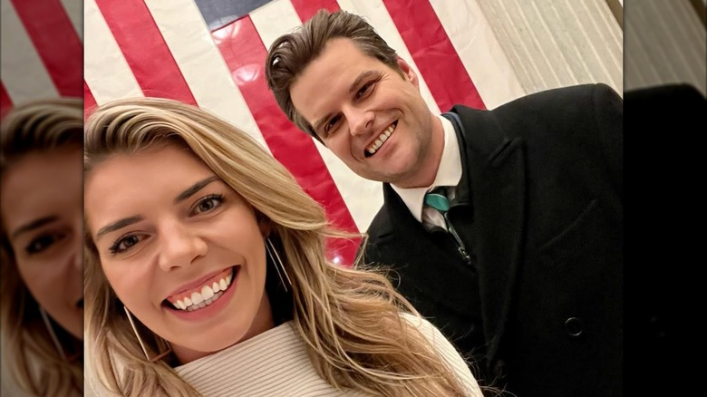 Ginger Gaetz and Matt Gaetz with American flag behind them