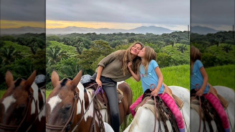 Gisele Bündchen and Vivian Brady on horses