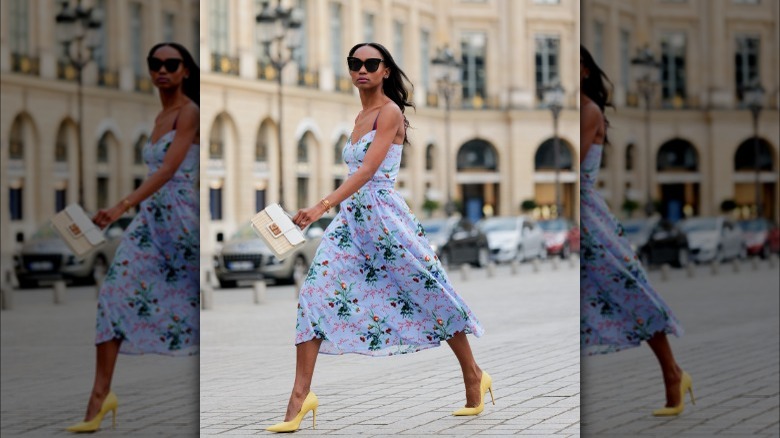 Woman in floral dress walking