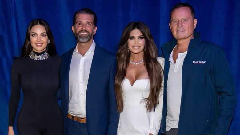 Donald Trump Jr. and Kimberly Guilfoyle smile for the camera while on the campaign trail