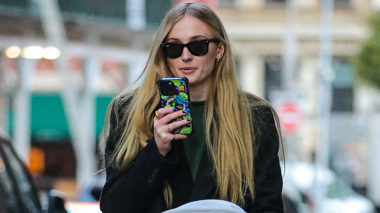 Sophie Turner pushing stroller