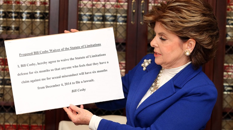 Gloria Allred holding Bill Cosby waiver of statute of limitations