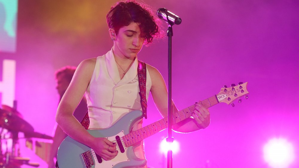 Gloria Estefan's daughter, Emily Estefan, playing guitar in 2015