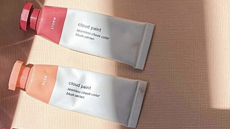 Three tubes of Glossier's Cloud Paint