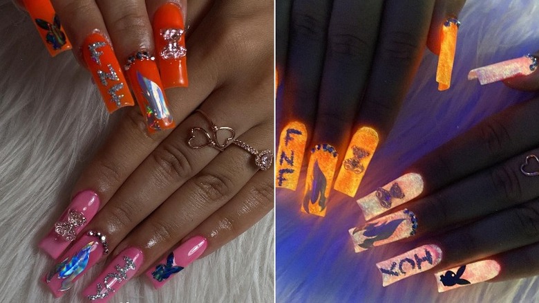 Orange glow in the dark nails with fire designs