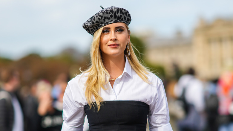 Woman in leopard beret