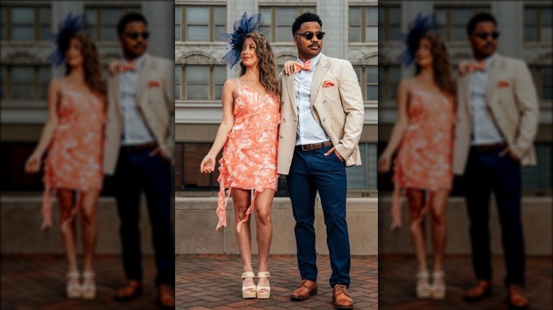 couple posing in matching outfits