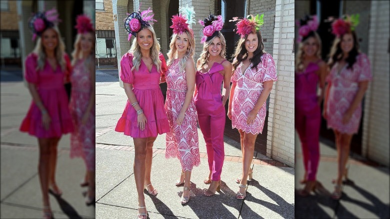 Women in coordinating pink outfits