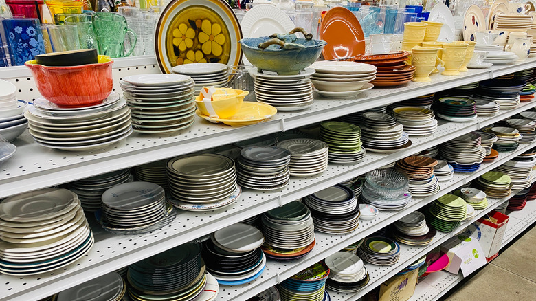 Shelves of kitchenware at a Goodwill store