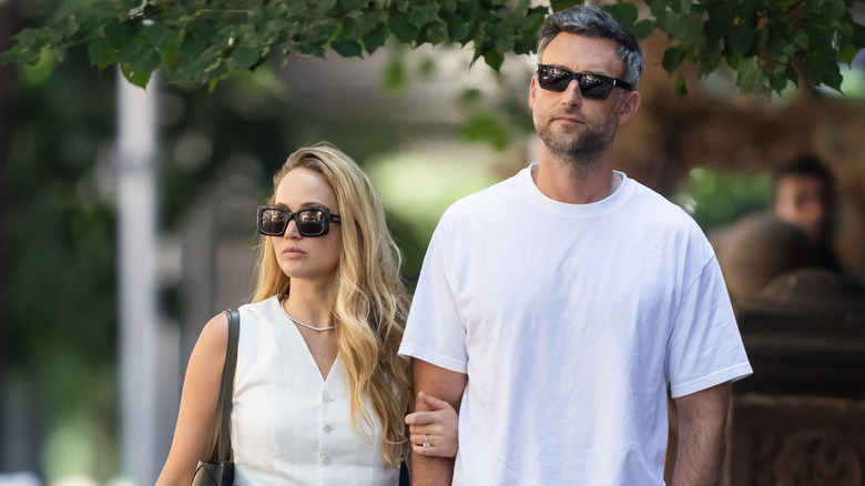 Jennifer Lawrence and Cooke Maroney walking