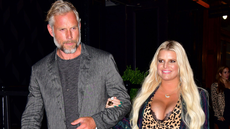 Jessica Simpson walking with Eric Johnson